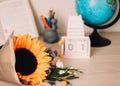 1 September. Sunflower and wooden calendar on school desk. Hello autumn. School year beginning. Back to school concept