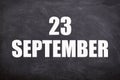 23 September text with blackboard background for calendar.