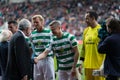 Ireland President Michael D. Higgins greets Damien Duff at Pairc Ui Chaoimh pitch for the Liam Miller Tribute match