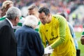 Ireland President Michael D. Higgins greets David Forde at Pairc Ui Chaoimh pitch for the Liam Miller Tribute match