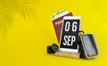 September 6th. Day 6 of month, Calendar date. Mechanical calendar display on your smartphone. The concept of travel. Autumn month