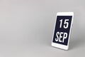 September 15th. Day 15 of month, Calendar date. Smartphone with calendar day, calendar display on your smartphone. Autumn month,