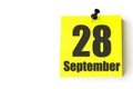 September 28th. Day 28 of month, Calendar date. Yellow sheet of the calendar. Autumn month, day of the year concept