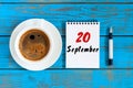 September 20th. Day 20 of month, loose-leaf calendar and coffee cup at Software Engineer workplace background. Autumn Royalty Free Stock Photo
