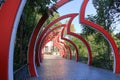 September 09 2023 - Tirana, Albania: Vodafone logos arching over a small Lana river bridge