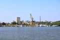 September 13 2021 - Tulcea in Romania: Industrial cargo port skyline, loading cranes in Tulcea on Danube river Royalty Free Stock Photo