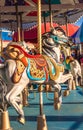 Sept. 2, 2012 - Vancouver, Canada: Detail of colourful vintage carousel horse ride at annual PNE Fair, late afternoon.