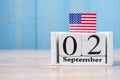 2 September of white Calendar with United States of America flag on wood background. copy space for text. Happy Labor day 2019 and Royalty Free Stock Photo