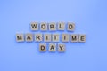 World Maritime Day, minimalistic banner with the inscription in wooden letters Royalty Free Stock Photo
