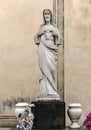 Sepulchral figure of Jesus on grave in Poblenou Cemetery