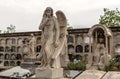 Sepulchral sculptures on graves in Poblenou Cemetery