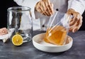 Sequence of man making homemade kombucha