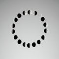 A sequence of moon phases arranged in a circular pattern against a gray background. Royalty Free Stock Photo