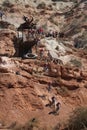 Sequence of mountain biker cliff drop