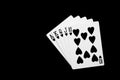 Royal flush sequence of playing cards on dark background Royalty Free Stock Photo