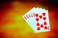 Royal flush sequence of playing cards on dark background Royalty Free Stock Photo