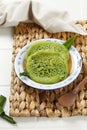 Serabi Pandan Kuah Kinca Durian is Traditional Indonesia Pancake, Green Color from panda Paste