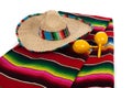 Serape, sombrero and maracas on a white background Royalty Free Stock Photo