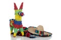 Serape, sombrero and pinata on white