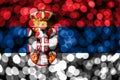 Serbia abstract blurry bokeh flag. Christmas, New Year and National day concept flag