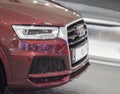 Serbia; Belgrade; April 2, 2017; Front of sour cherry colour Audi Q3; the 53rd International Motor Show in Belgrade from March