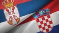 Serbia and Croatia two flags textile cloth, fabric texture