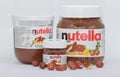 Serbia; Kragujevac; November 4, 2018; Small and big nutella jars with hazelnuts isolated on white