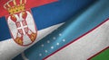 Serbia and Uzbekistan two flags textile cloth, fabric texture