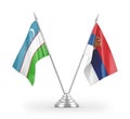 Serbia and Uzbekistan table flags isolated on white 3D rendering