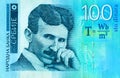 Serbian 100 dinara currency banknote, close up. Serbia money RSD dinar cash, macro view, portrait of scientist Nikola Tesla.