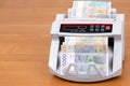 Serbian dinars in a counting machine Royalty Free Stock Photo