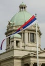 Serbian flag in front of National Assembly of Serbia in Belgrade Royalty Free Stock Photo