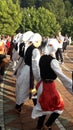 Serbian folklore dancing around the fountain in beautiful medical spa wellness center Banja Koviljaca