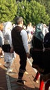 Serbian folklore dancing around the fountain in beautiful medical spa wellness center Banja Koviljaca