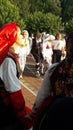 Serbian folklore dancing around the fountain in beautiful medical spa wellness center Banja Koviljaca