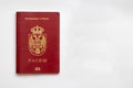 Serbian passport isolated on left side on white paper background