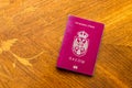 Serbian passport on a wooden table