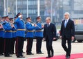 Serbian President B.Tadic (R) and Russian Prime Minister V.Putin review a guard of honor in Belgrade