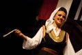 Serbian woman folk dancer isolated on black