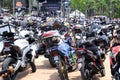 Thousands of motorcycles of all sizes and engine capacities are parked in big parking space. Royalty Free Stock Photo
