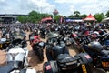 Thousands of motorcycles of all sizes and engine capacities are parked in big parking space. Royalty Free Stock Photo