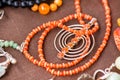 Serdolik carnelian stone necklace laying on natural brown linen tablecloth