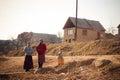 SEREDNIE, UKRAINE - MARCH 09, 2011: Three generations living in the same poor conditions