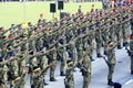 Malaysian soldiers in uniform and fully armed.