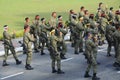 Malaysian soldiers in uniform and fully armed.