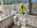 Blockwork by construction workers at the construction site. Royalty Free Stock Photo