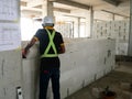 Blockwork by construction workers at the construction site. Royalty Free Stock Photo