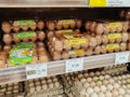 Fresh chicken eggs in a pallet container, for sale in a supermarket. Sort by grade and size.