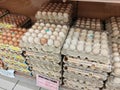 Fresh chicken eggs in a pallet container, for sale in a supermarket. Sort by grade and size.