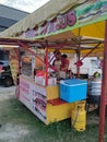 Street vendors and hawkers sell local goods and food to the public on-street by opened a small stall.